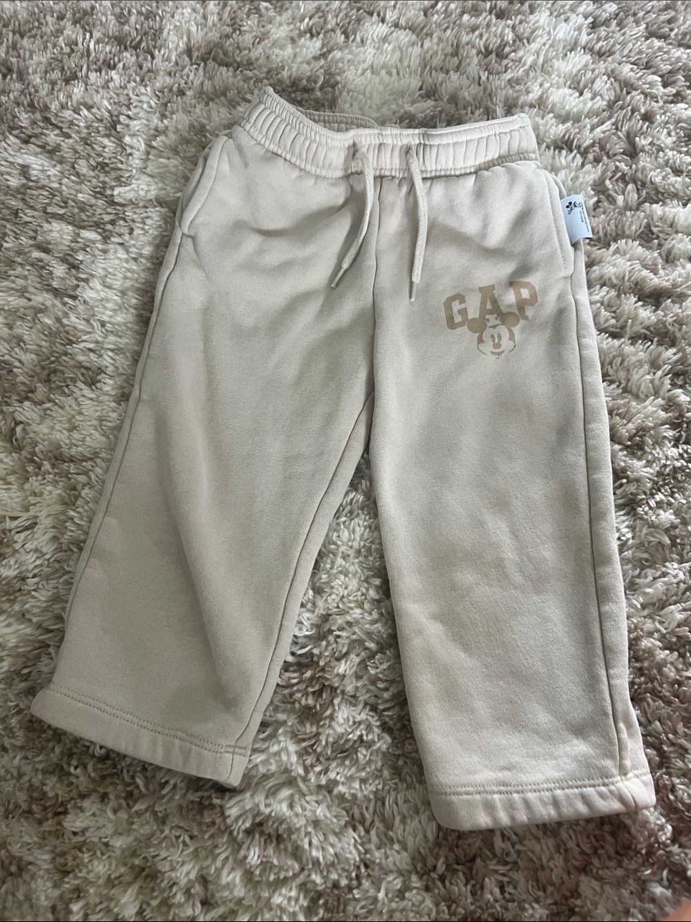 GAP Kids Light Beige Fleece Joggers with Mickey Graphic